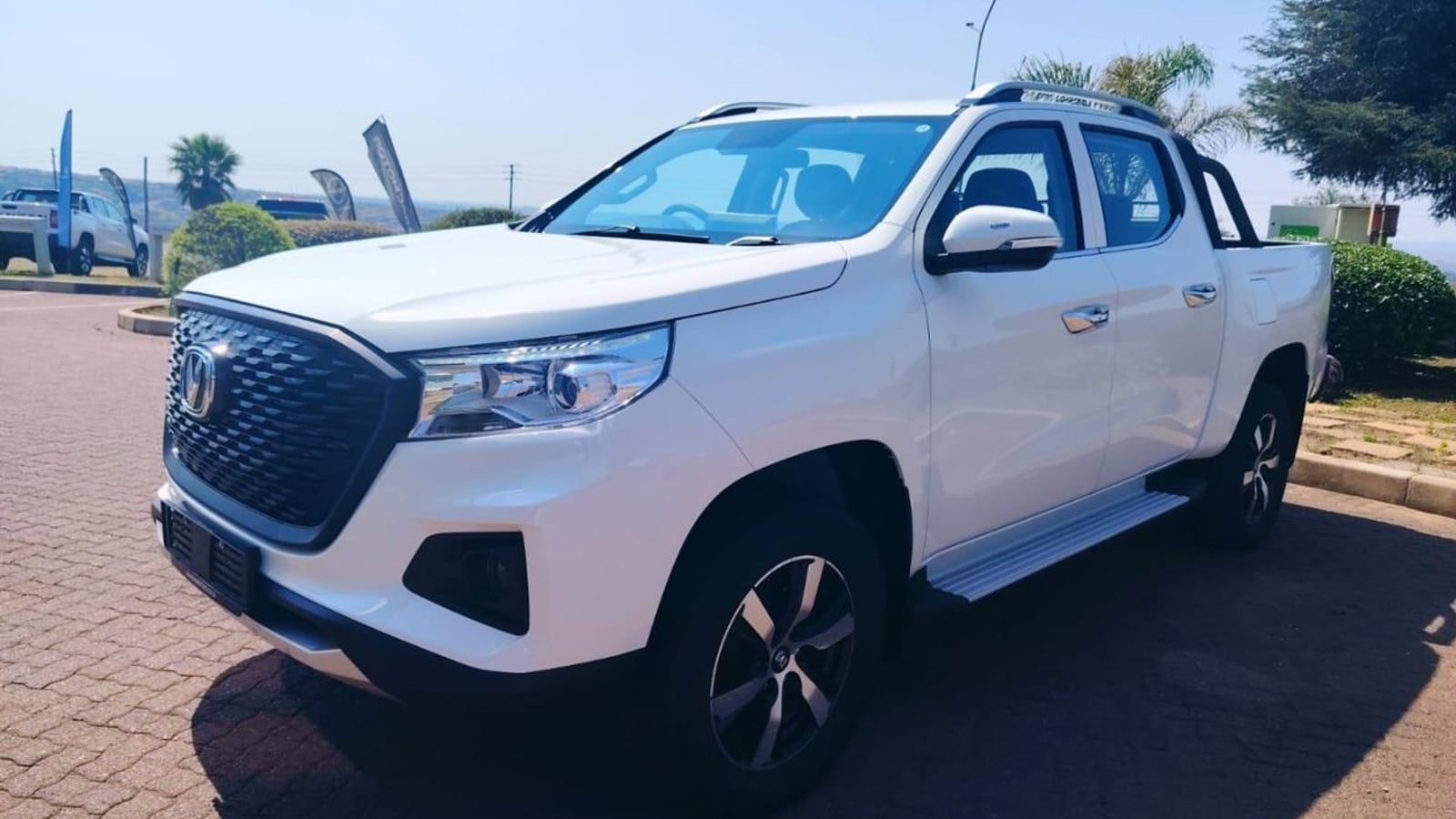 A new 2026 Changan Hunter 2.0D CE 4x4 double cab automatic parked outside a dealership in Emalahleni
