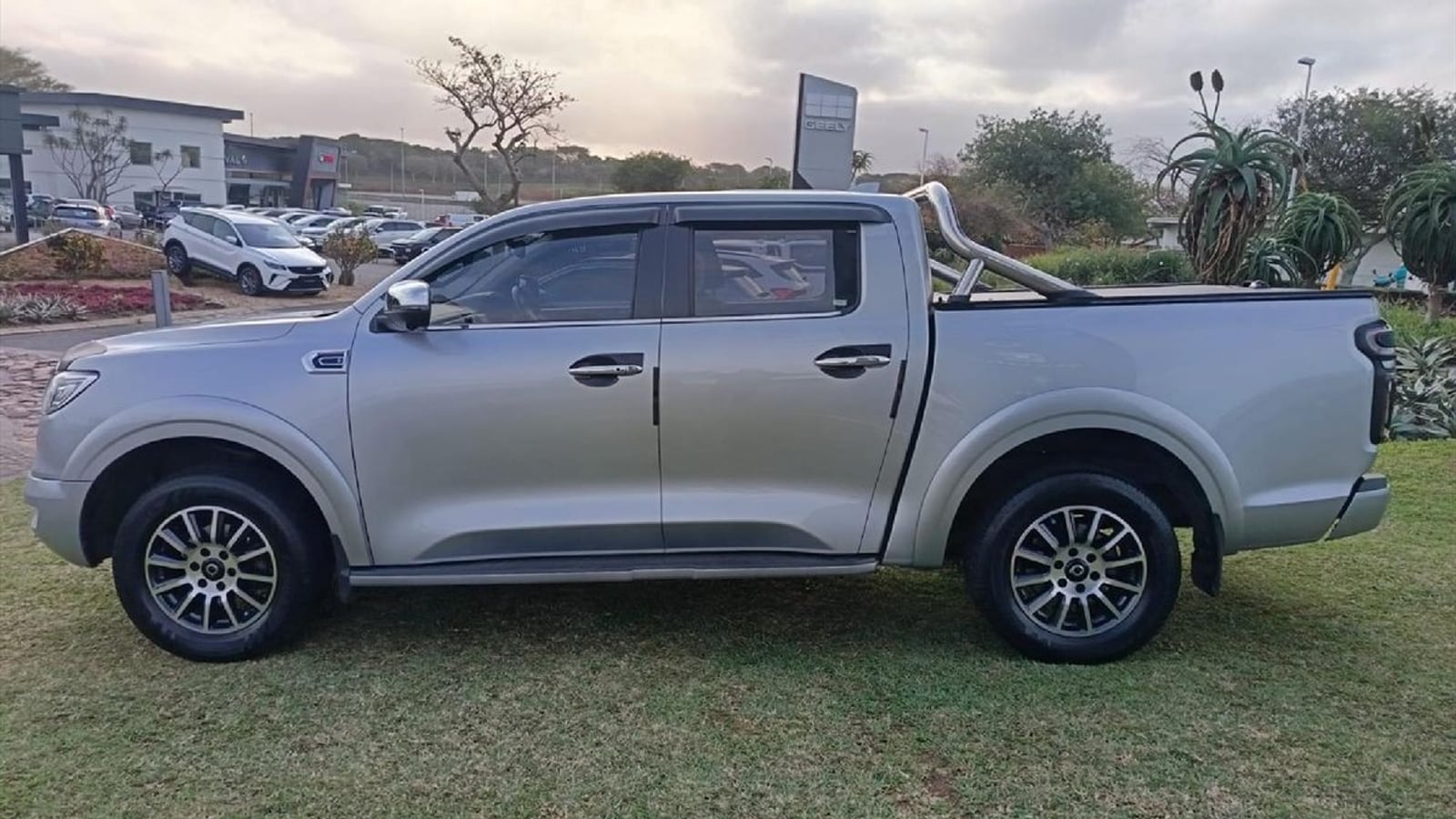 A white 2022 GWM P-Series 2.0 LT automatic double cab parked on grass in Umhlanga, KwaZulu-Natal